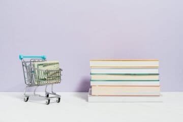Kitap çıkarma maliyetini temsil eden kitaplar ve hesaplama görseli